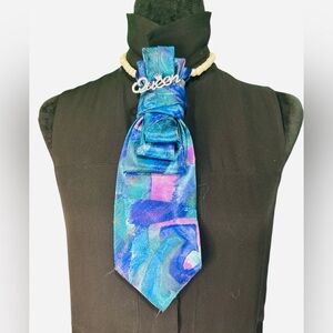 Elegant Blue Multicolored Necktie featuring a Queen Brooch